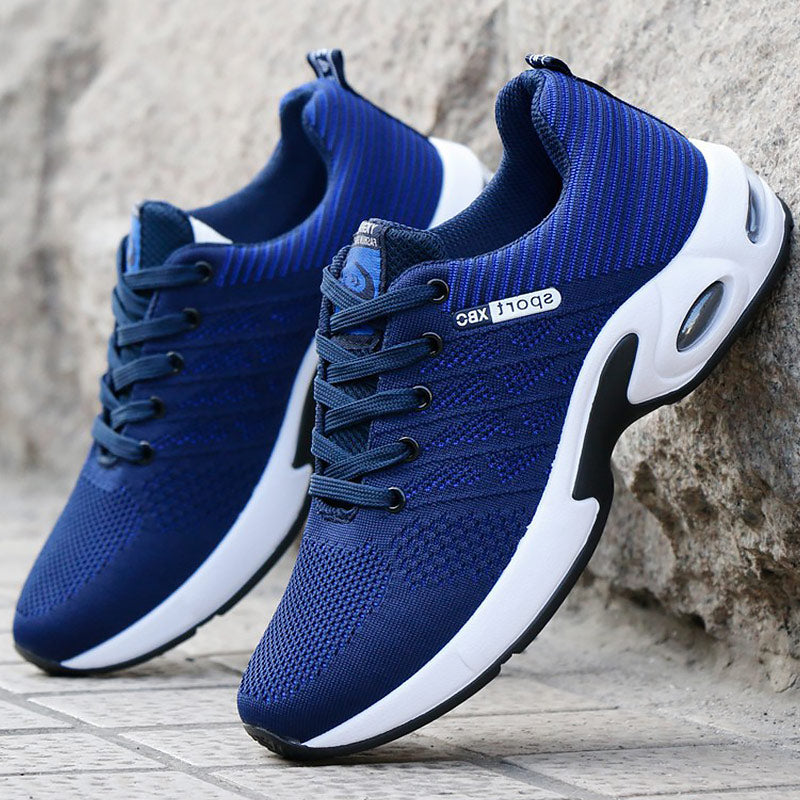 "Sneakers orthopédiques homme, cuir bleu, semelle amortissante, style moderne pour confort quotidien."